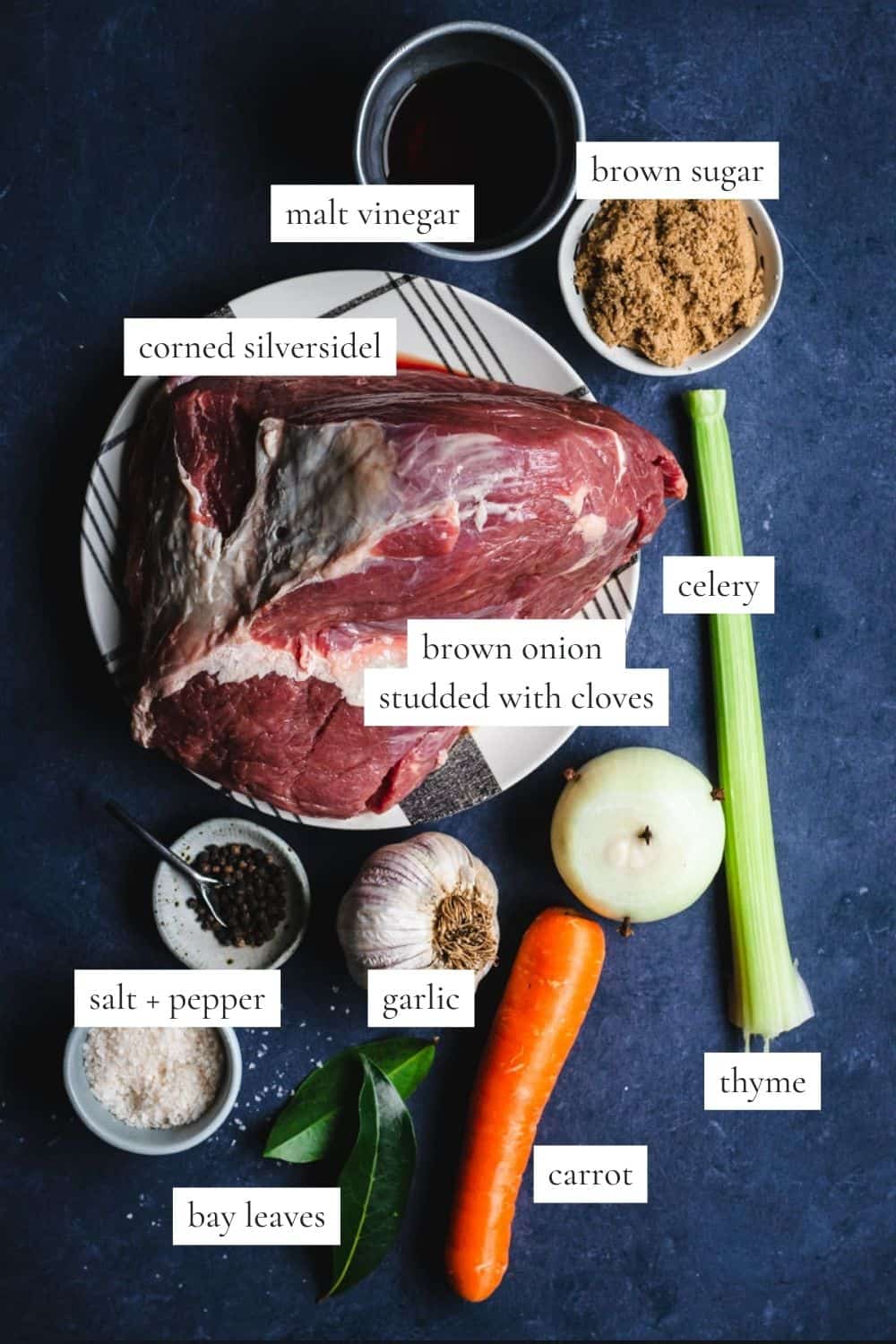 All the ingredients you need to make corned beef in a dutch oven.